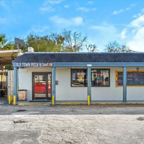 1 block away from a local pizzeria and tavern