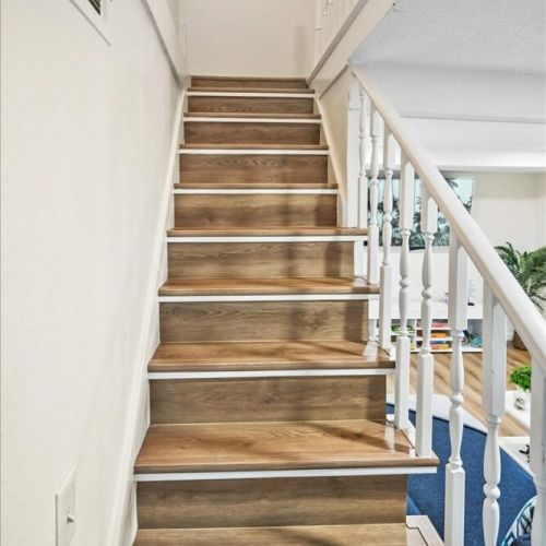 Staircase. 3 bedrooms and 2 full bathrooms upstairs.