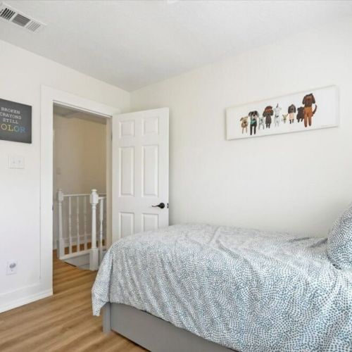 Guest bedroom 3 with a trundle bed that has two single mattresses